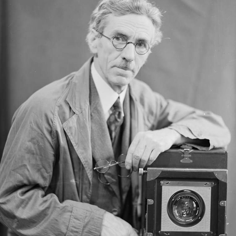 Portrait of Harold Cazneaux leaning on a camera by Cazneaux. Cazneaux family photograph collection. Courtesy of National Library of Australia